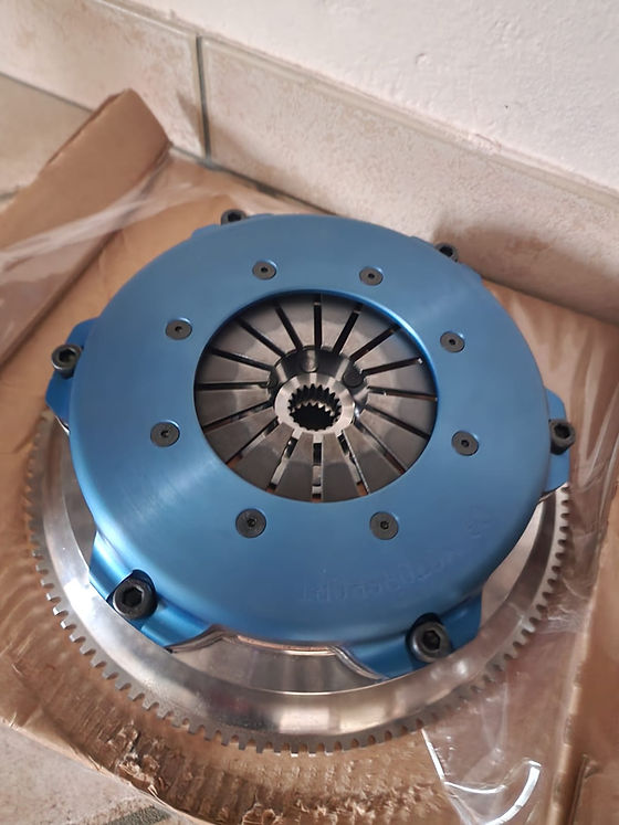 DOUBLE DISC CLUTCH AND FLYWHEEL