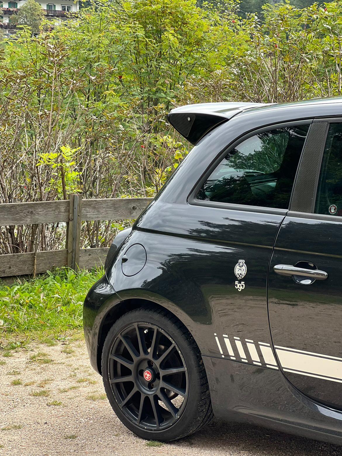 Adjustable rear spoiler wing Abarth 500 595 installation over the original