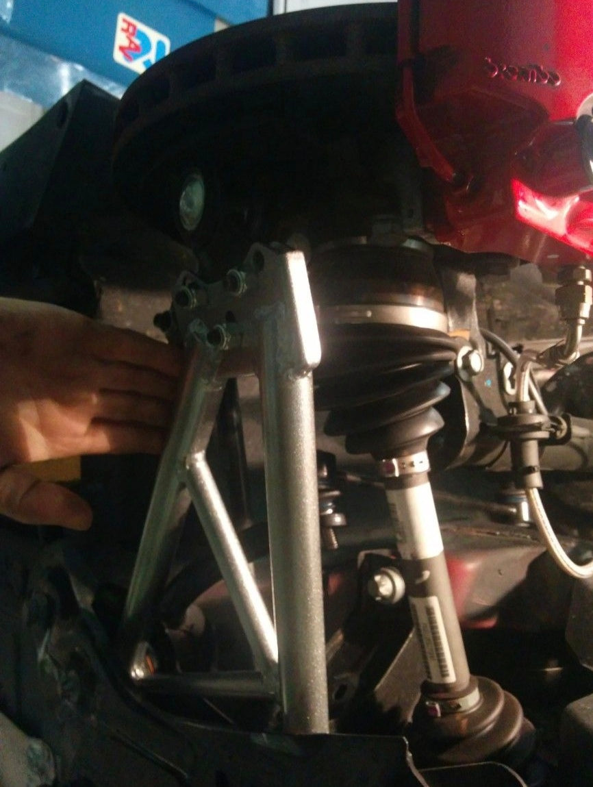 DNA Racing front trapezoid kit