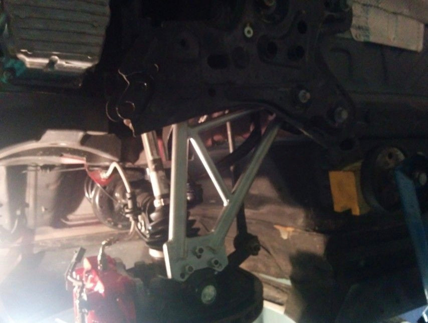 DNA Racing front trapezoid kit