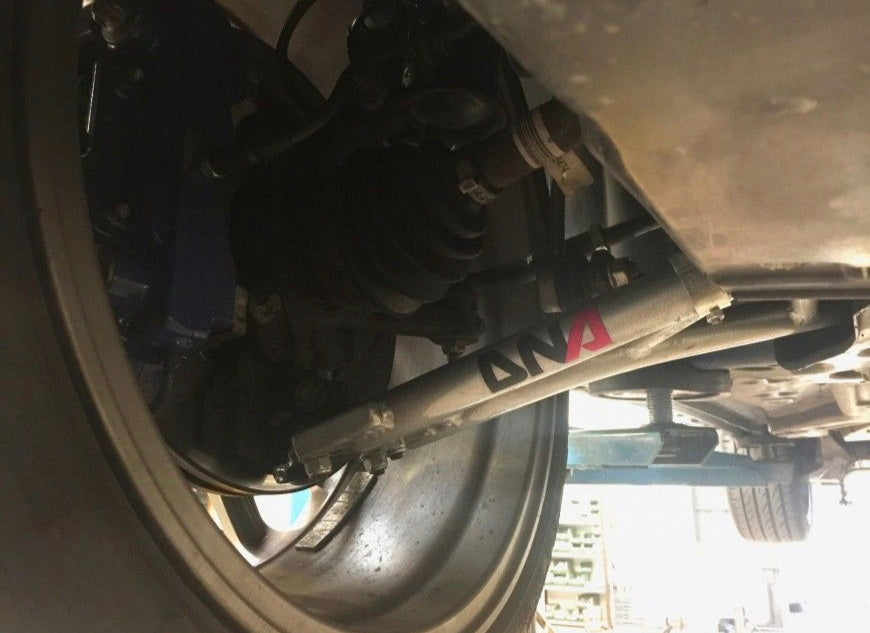 DNA Racing front trapezoid kit