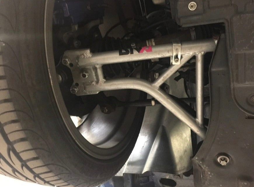 DNA Racing front trapezoid kit