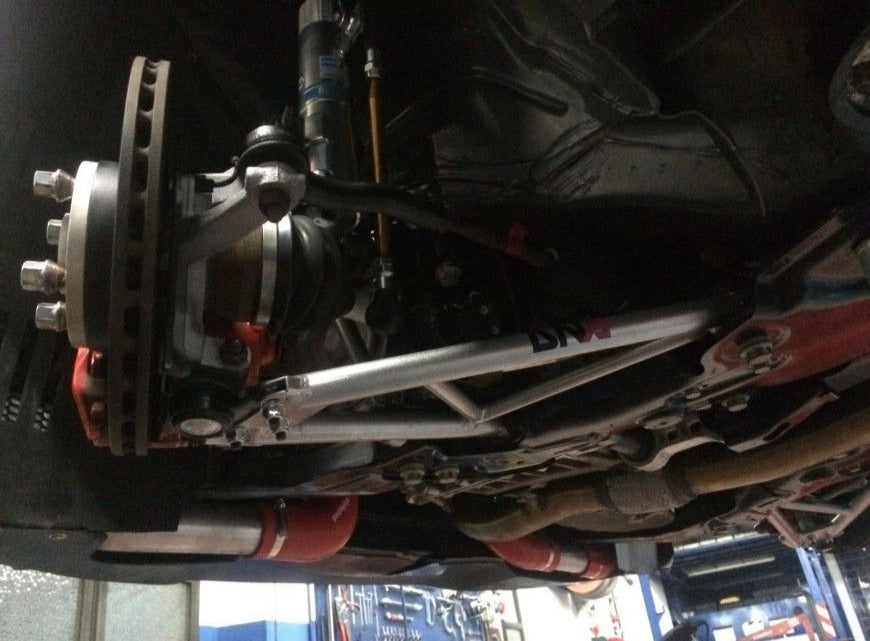 DNA Racing front trapezoid kit 